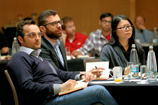 Students listening during a business study session